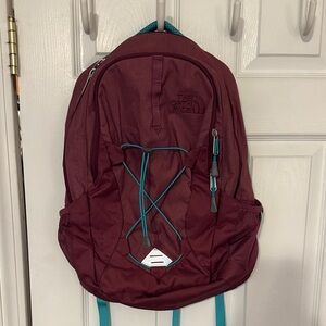 The North Face Jester Burgundy Backpack with Teal Accents